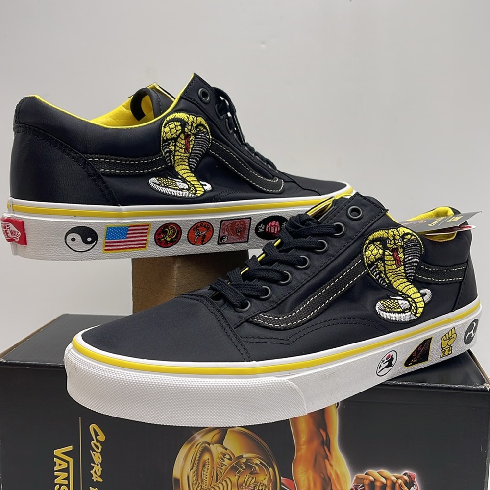 Vans WMNS Old Skool
Cobra Kai Black/Yellow/White 
VN0A3WKT05N
Sneakers